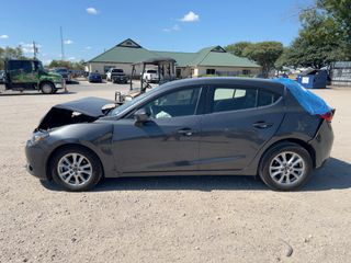 2015 Mazda Mazda3 Hatchback i Grand Touring - Exterior Side Driver Image